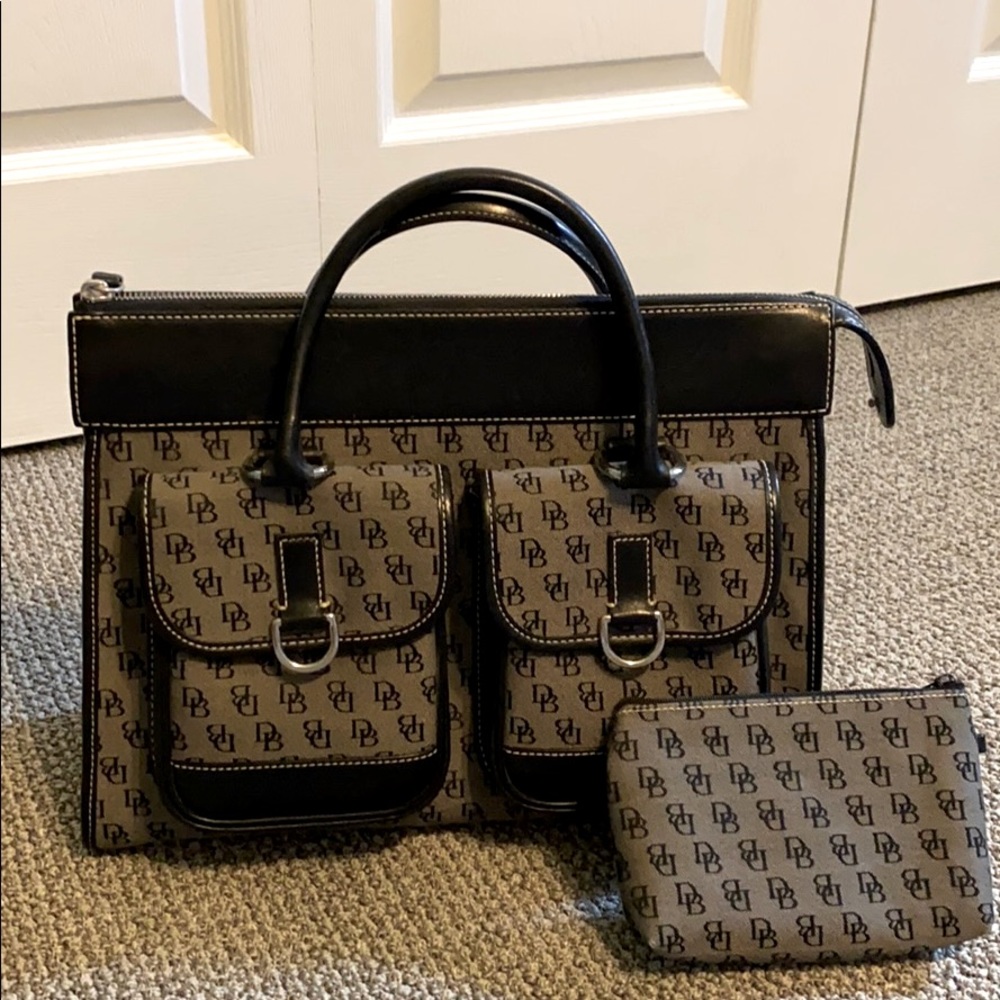 Dooney and Bourke hand bag with make up pouch .